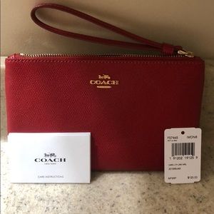 Brand new Coach wristlet